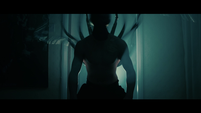 The Stranger - film still - the figure in the doorway