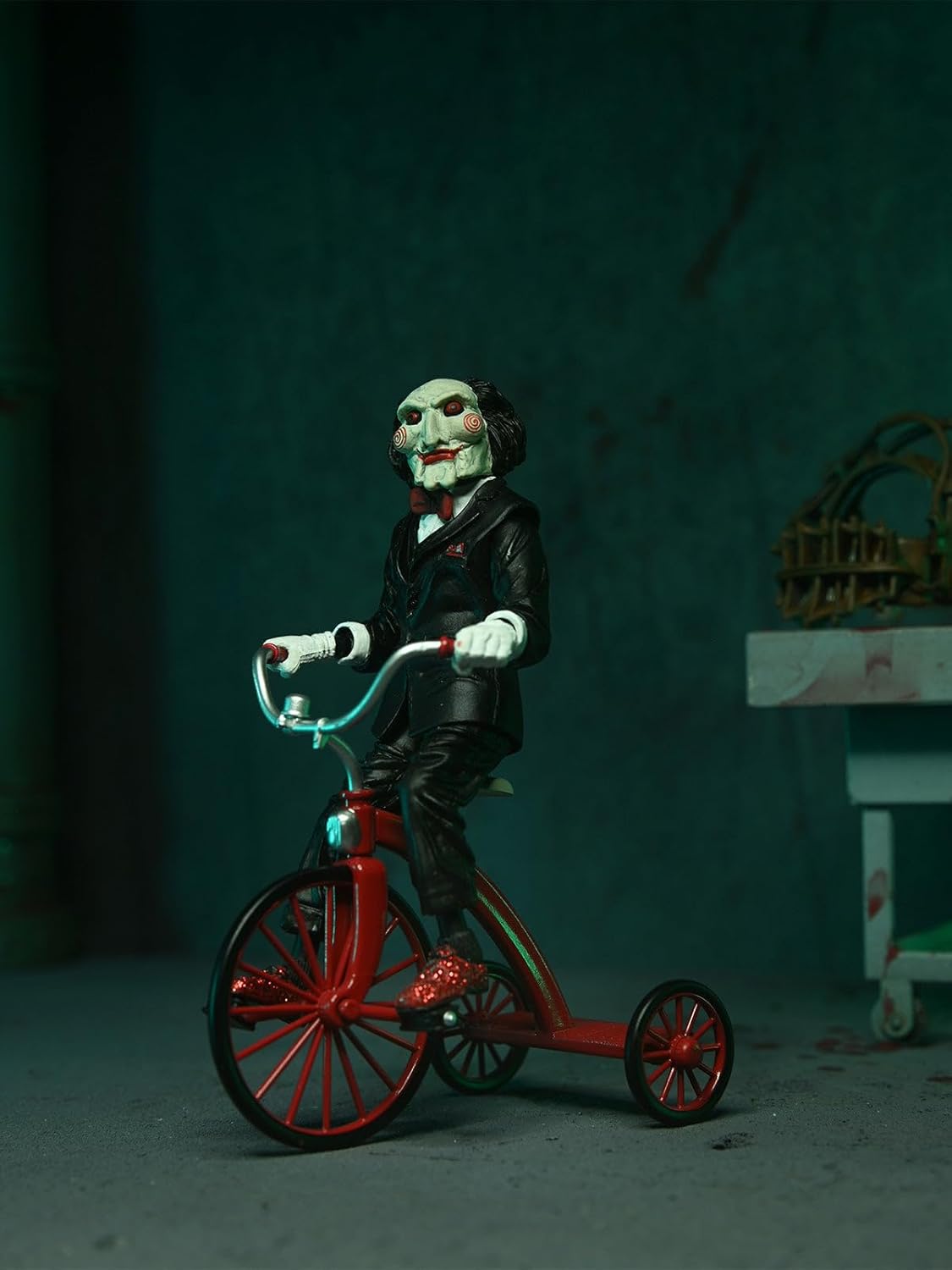 NECA SAW Jigsaw Killer 7″ Scale Ultimate Action Figure (Red Robe)